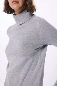 high neck sweater with buttons at cuffs